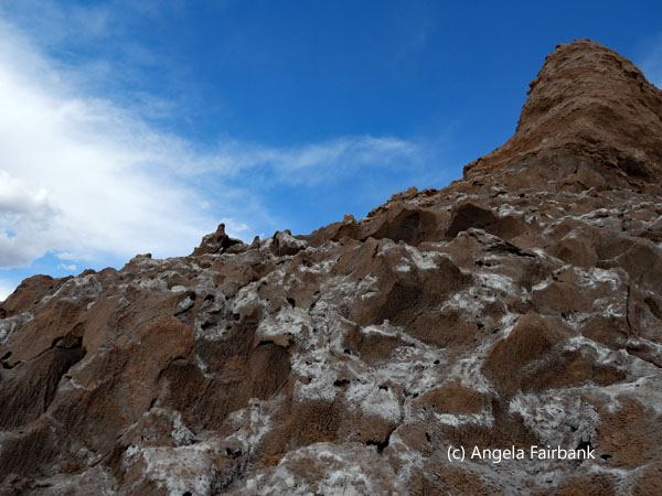 promontory in atacama desert with salt deposits