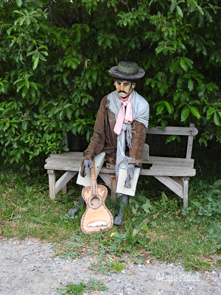status of gaucho with guitar