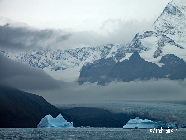 two icebergs in the shape of ships
