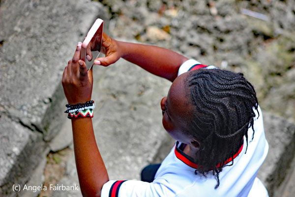 girl taking photo