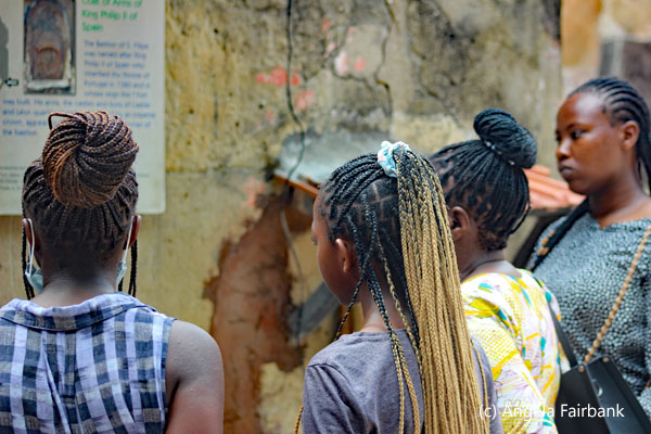 women listening to guide