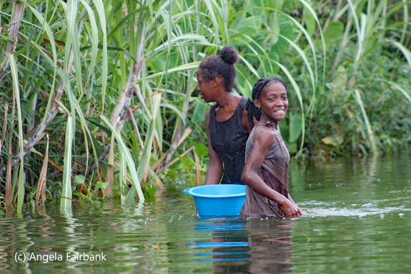 girls with bucket