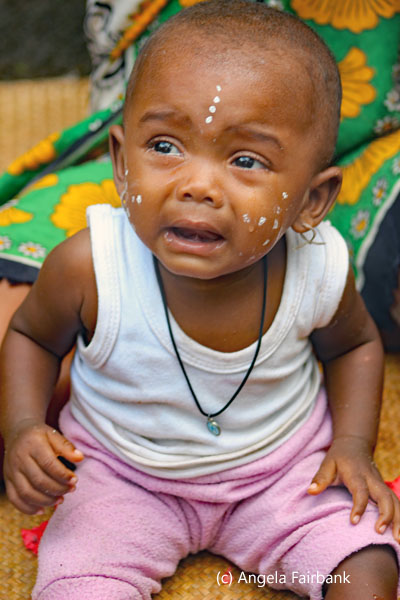 baby with face paint