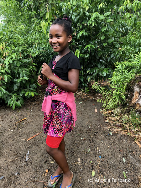 smiling girl in pink and black