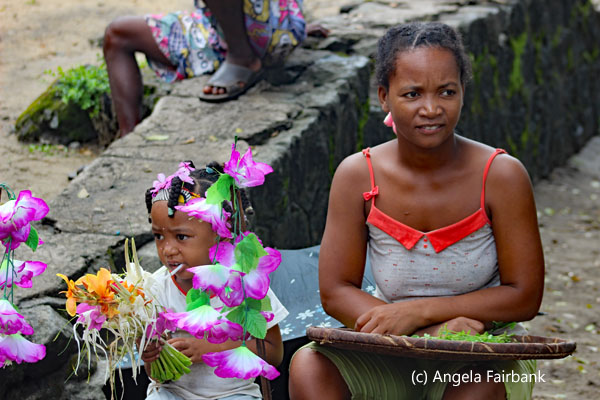 women with child and flowers