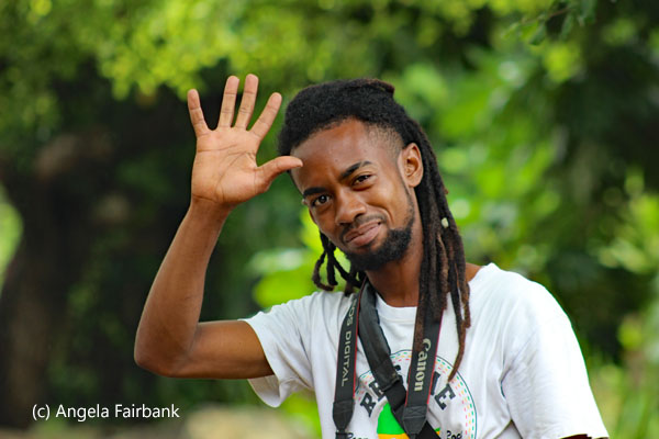 young man waving