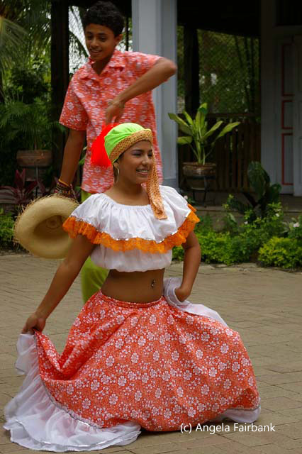 dancing pair in orange and green 2