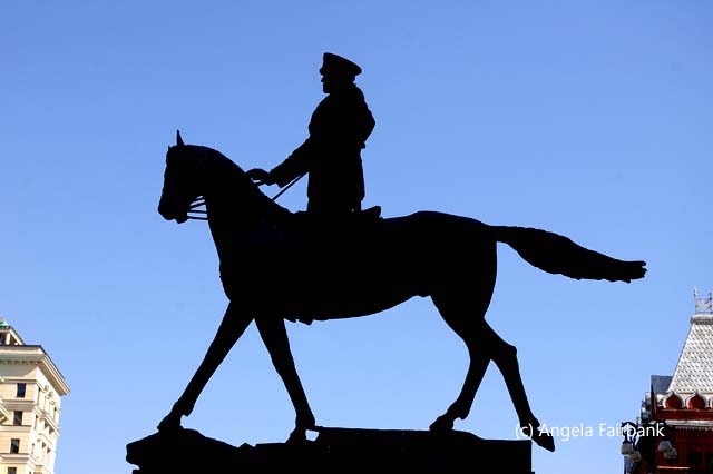 horse and rider statue from side