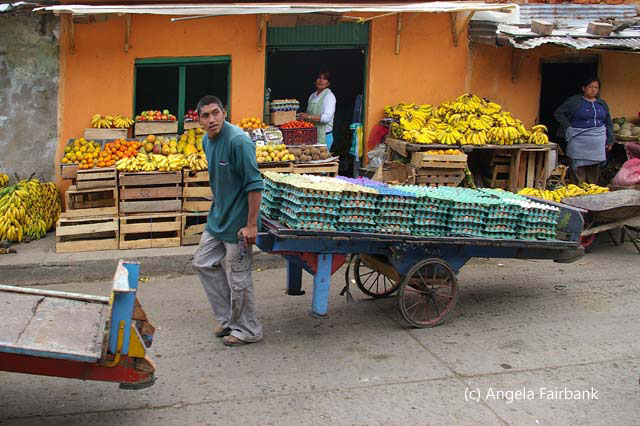 man pulling cart