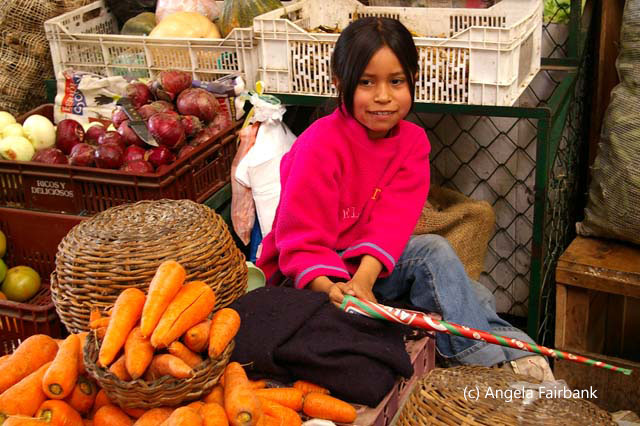 girl with large carrots