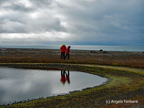 couple reflected in lake