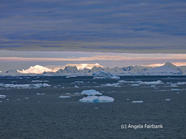 icebergs with changing sky 1