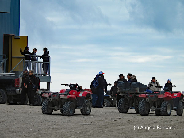 atvs and gathering at community centre