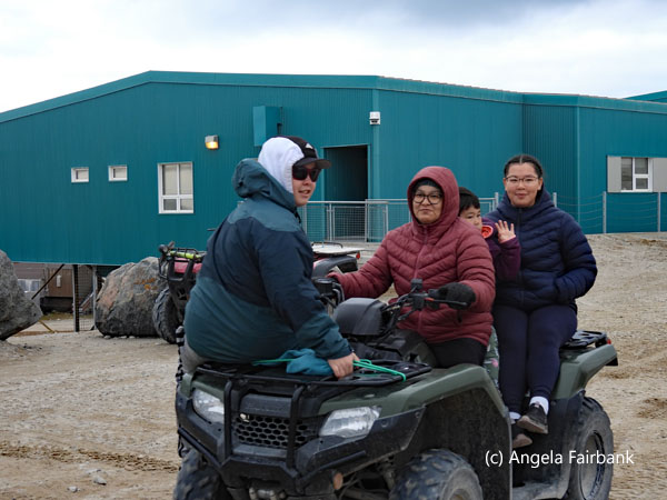 family on an ATV