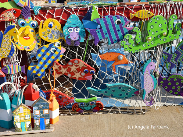 colourful wooden art on the pier