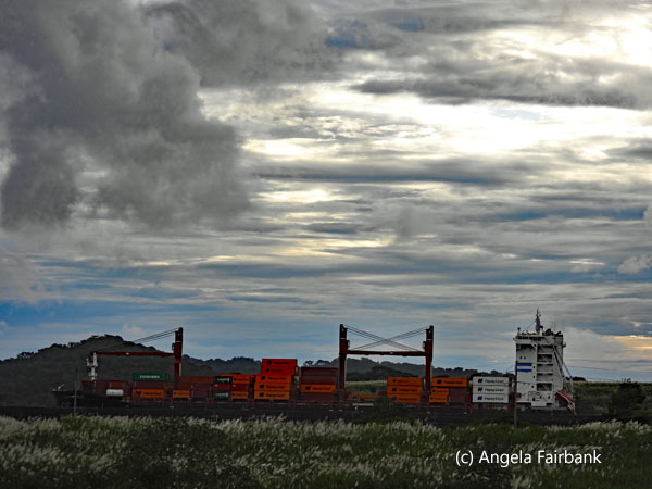 container ship passing at higher panamax canal