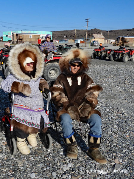 two inuits in parkas