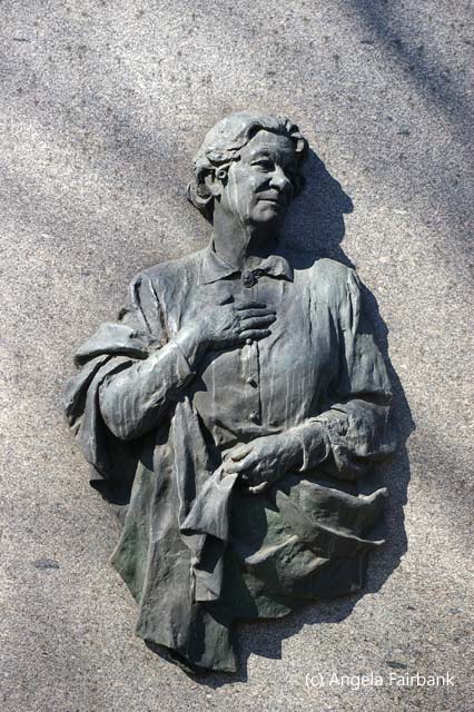 woman on grave