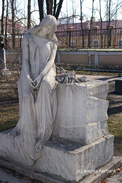 young woman on grave
